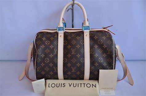 lv travel bag fake|check my louis vuitton bag.